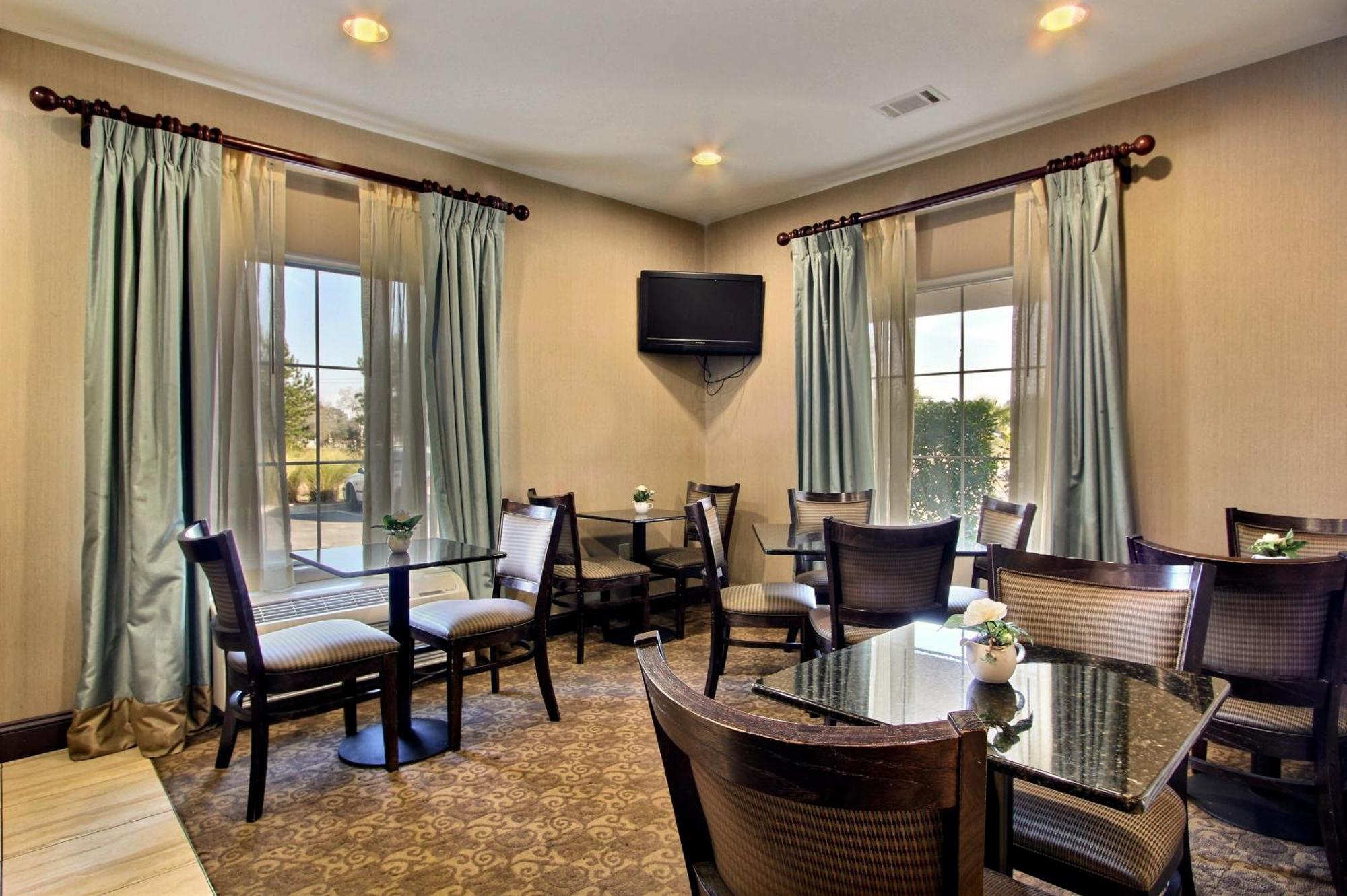 Magnolia Inn And Suites Pooler Exterior photo