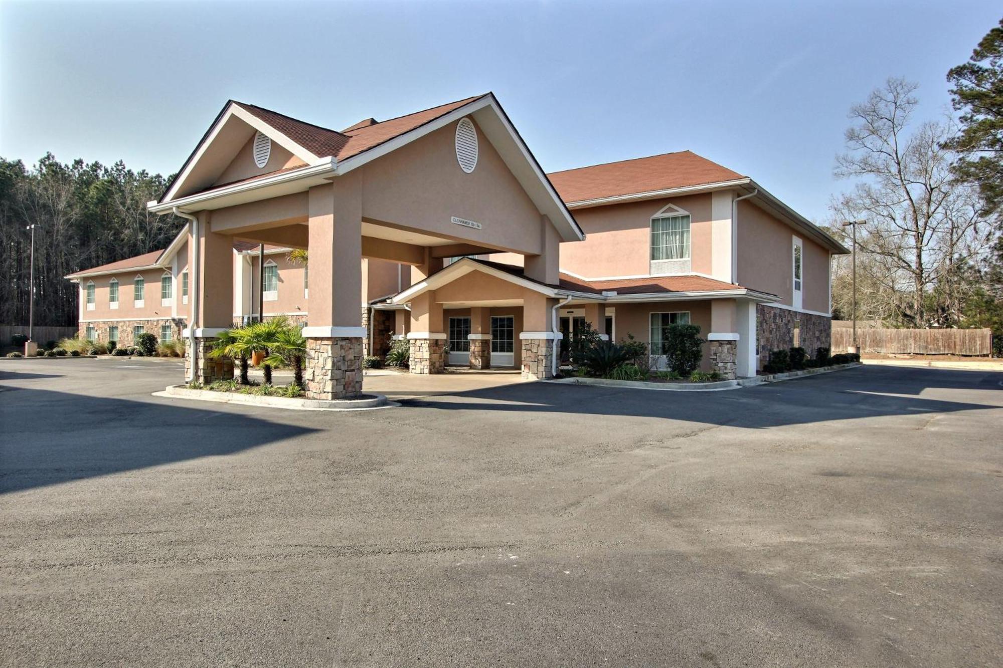 Magnolia Inn And Suites Pooler Exterior photo